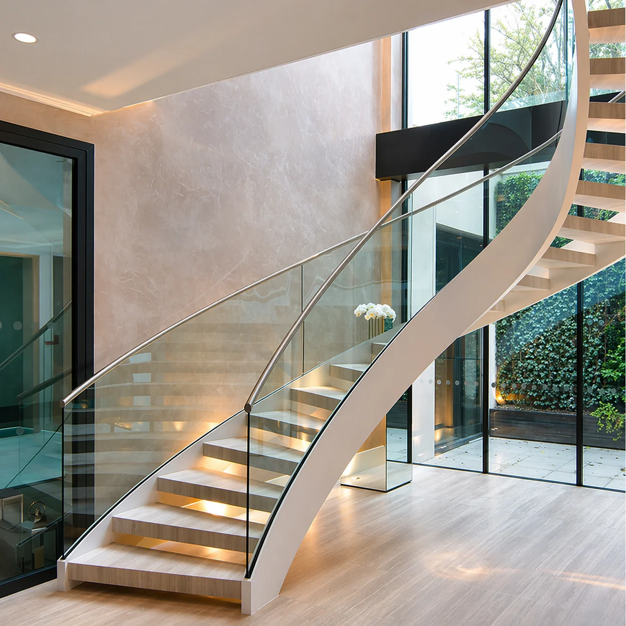 Staircase glass handrail system by Riaz Glass Dubai